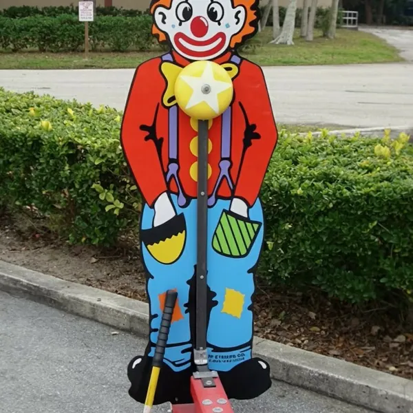 The clown design kiddie high striker game standing outdoors