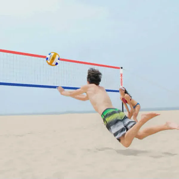 People playing volleyball over an outdoor net
